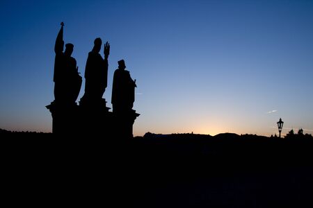 PRAGUE, CZECH REPUBLIC - AUGUST 4:  Three statues on the Charles Bridge on August 4, 2012 in Prague, Czech Republic. Construction of the bridge started in 1357 under the auspices of King Charles IV.のeditorial素材