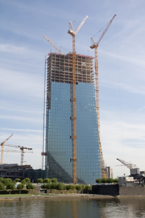 FRANKFURT, GERMANY - AUG 23: The new European Central Bank Headquarters under construction on August 23, 2012 in Frankfurt, Germany. The 500 million euro project will be completed in mid 2014.のeditorial素材
