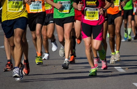 VALENCIA, SPAIN - OCTOBER 21: Runners compete in the XXI Valencia Half Marathon on October 21, 2012 in Valencia, Spain.のeditorial素材
