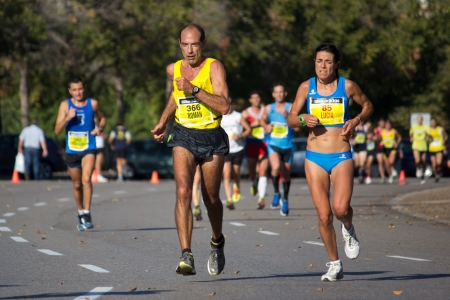 VALENCIA, SPAIN - OCTOBER 21: Runners compete in the XXI Valencia Half Marathon on October 21, 2012 in Valencia, Spain.のeditorial素材