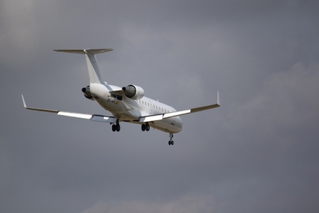 VALENCIA, SPAIN - APRIL 30: A Canadair CL-600-2B19 Regional Jet aircraft, operated by Air Nostrum, landing at the Valencia Airport on April 30, 2013 in Valenica, Spain. Air Nostrum is an independent carrier which operates as a franchisee of Iberia Airlineのeditorial素材