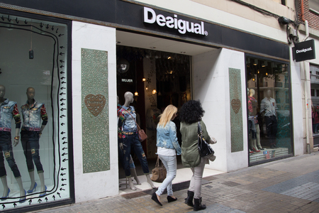 VALENCIA, SPAIN - SEPTEMBER  28, 2015: A Desigual clothing store in Valencia. Desigual is a casual clothing brand based in Barcelona, Spain.のeditorial素材