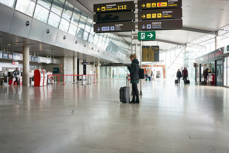VALENCIA, SPAIN - APRIL 30, 2016: Airline passengers inside the Valencia Airport. About 4.59 million passengers passed through the airport in 2015.のeditorial素材