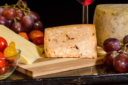 Farmhouse aged Mexican cheeses with wine, grapes and heirloom tomatoes