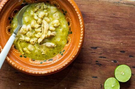 Pozole verde, or green posole is traditionally made with hominy and meat and topped with condiments. Mexican cuisine.の写真素材