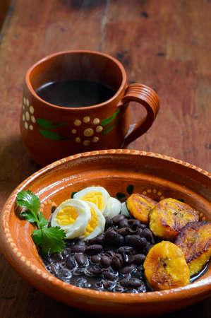 Traditional Mexican and Central American breakfast. Black beans and plantain