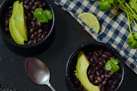 Black beans and avocado with cilantro. Mexican food.の写真素材