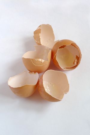 Broken eggs on the table