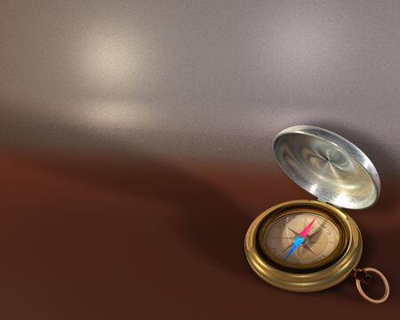 Opened compass on metallic backgroundの写真素材