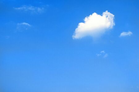 White little cloud in blue skyの写真素材