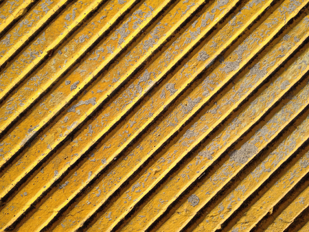 A yellow Concrete Wall with Stripesの写真素材