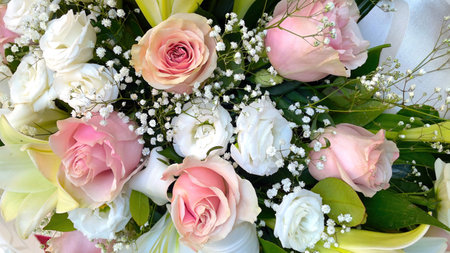 Wedding bouquet of white and pink roses and gypsophilaの写真素材