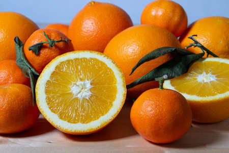 Some oranges over a wooden surfaceの写真素材