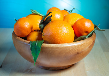 Some oranges over a wooden surfaceの写真素材