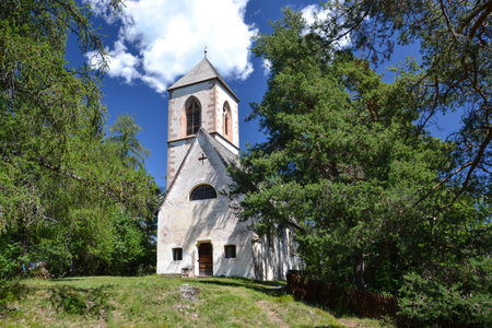 Mountain landscape with church on itの写真素材