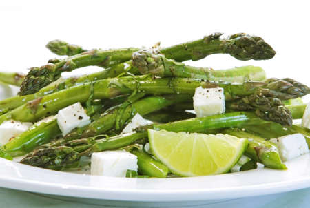 Fresh asparagus salad with fetta cheese, spring onions and lime.  の写真素材