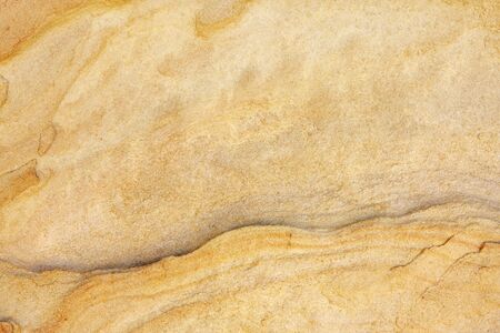 Weathered sandstone texture, in close-up.  Grainy natural background.の写真素材