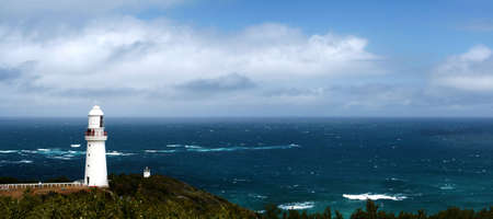 Lighthouse at Cape Otway, Victoria, Australia, commissioned in the 1830's, looking out over the wild Southern Ocean.の写真素材