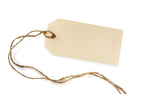 Blank tag tied with brown string.  Isolated on white.の写真素材