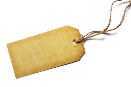 Blank grunge tag tied with brown string.  の写真素材