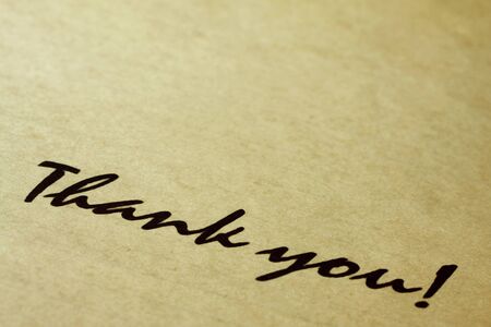Thank you, written on aged lined notepaper.  Lots of copy space.の写真素材