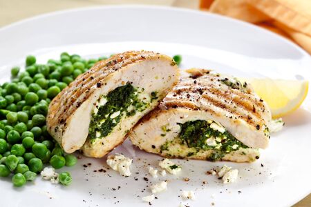 Grilled chicken breasts stuffed with spinach and feta cheese.  Delicious!の写真素材