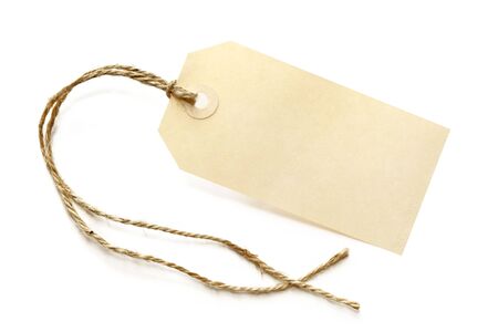 Blank shipping tag, tied with brown string, isolated on white.の写真素材