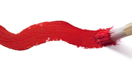Artist's paintbrush, with red paint brushtroke over white background.
