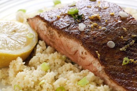 Grilled Atlantic salmon with a Moroccan seasoning, served with cous cous.の写真素材