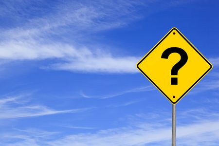 Question mark road sign over brilliant blue sky.  の写真素材