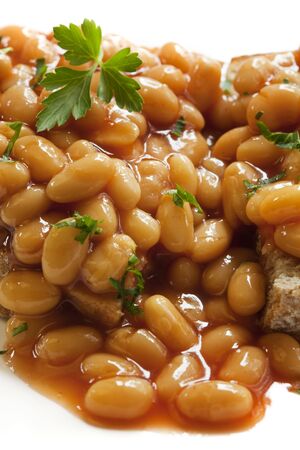 Baked beans on toast, in closeup. Delicious.