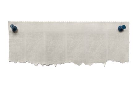 Blank torn newspaper banner, fastened with blue pushpins.  Isolated on white.の写真素材