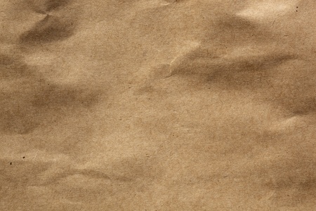 Closeup of brown paper.  Lots of texture and detail.の写真素材