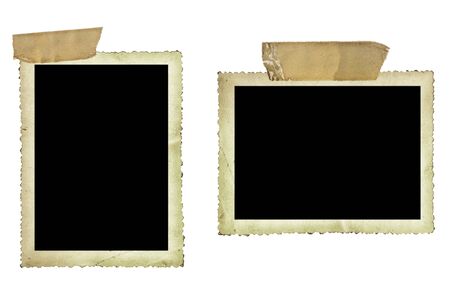 Vintage photo borders fastened with old sticky tape, isolated on white.の写真素材