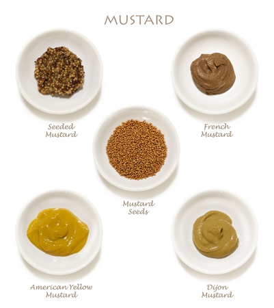 Collection of mustards, isolated on white.  Includes wholegrain, Dijon, American yellow, French, and mustard seeds.の写真素材