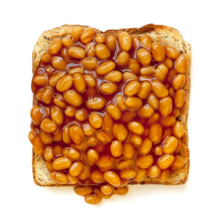 Baked beans on toast, isolated on white background   Overhead view の写真素材