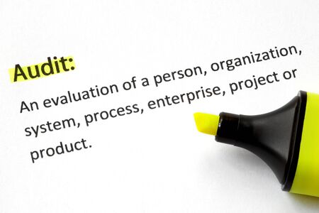 Definition of the word Audit, highlighted by yellow marker.の写真素材