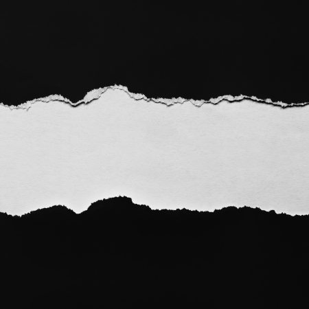 Torn black paper with space for copy.の写真素材