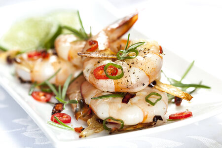 Grilled shrimp with garlic, rosemary and chili.の写真素材