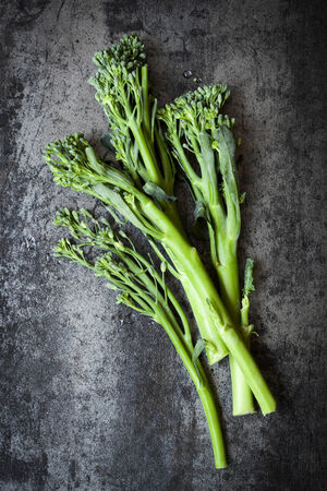Broccolini on dark slate.  Overhead view.の写真素材