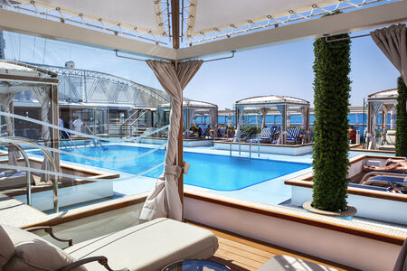 Pool deck with cabanas on board luxury cruise ship.のeditorial素材