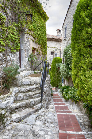 Winding narrow stone streets in Eze near Nice, France.  