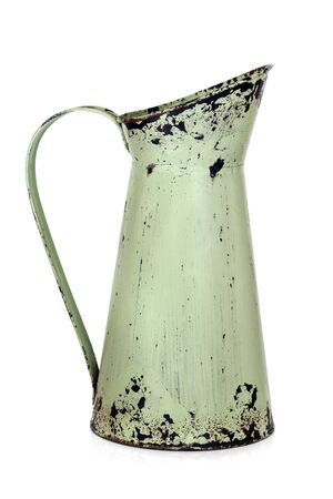 Shabby chic retro metal jug isolated on white.の写真素材