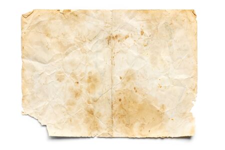 Old stained and torn paper isolated on white.の写真素材