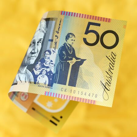 Australian money over vibrant golden background.の写真素材