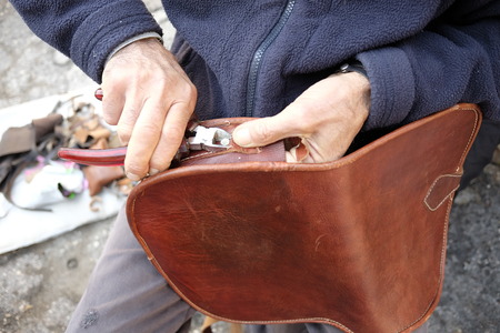 craftsman repair leather handbag