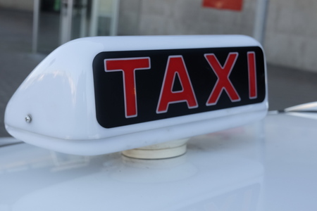 written taxi on the carの写真素材