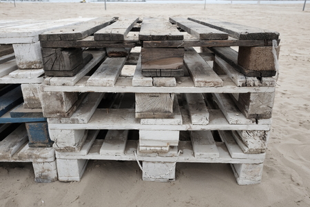 pile of pallets on the beach