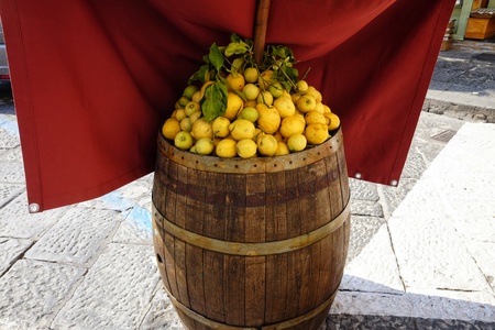 decorative lemons on wooden barrelの写真素材