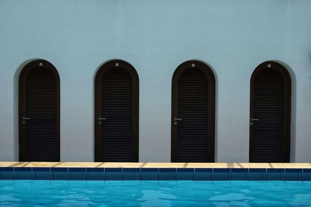 series of changing rooms near swimming pool